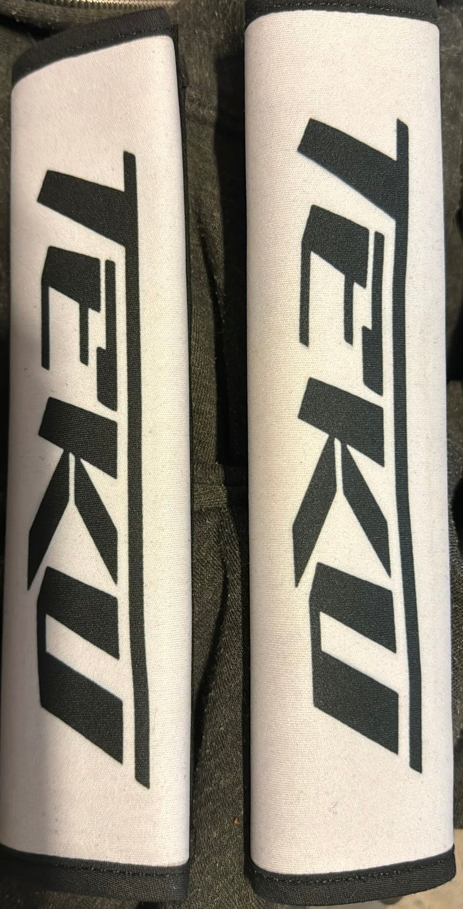 Teku - Seat Belt Cover (CLEARANCE/DISCOUNTED MISPRINTS AND SCORCHMARKS)